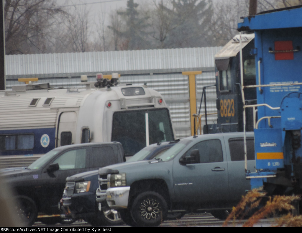 CSX 8823 and a FRA car 